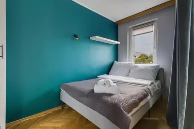 Łóżko lub łóżka w pokoju w obiekcie Karmelicka 19 Green View Apartment by Solarento