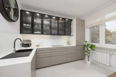 Kuchnia lub aneks kuchenny w obiekcie Pastel Apartment Andersa in Warsaw with Air Conditioning by Noclegi Renters
