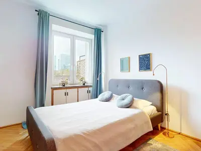 Łóżko lub łóżka w pokoju w obiekcie Central View Apartment Metro Swietokrzyska