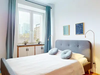 Łóżko lub łóżka w pokoju w obiekcie Central View Apartment Metro Swietokrzyska