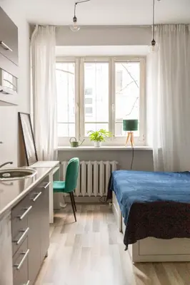 Łóżko lub łóżka w pokoju w obiekcie The Green Poznańska