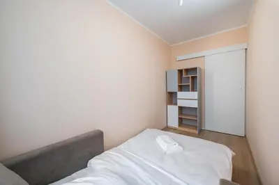 Łóżko lub łóżka w pokoju w obiekcie Solec Powiśle Comfort Apartment by BookingHost