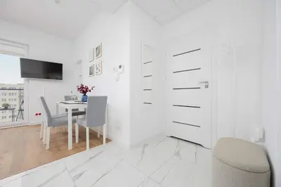 Telewizja i/lub zestaw kina domowego w obiekcie Kasprzaka Comfy Apartment near Metro Plocka with AC by Noclegi Renters