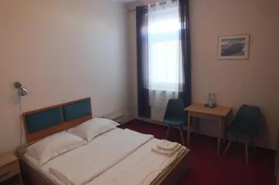 Łóżko lub łóżka w pokoju w obiekcie Motel Subaru
