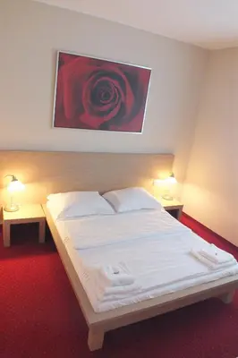 Łóżko lub łóżka w pokoju w obiekcie Motel Subaru