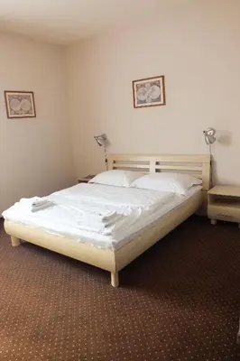 Łóżko lub łóżka w pokoju w obiekcie Motel Subaru