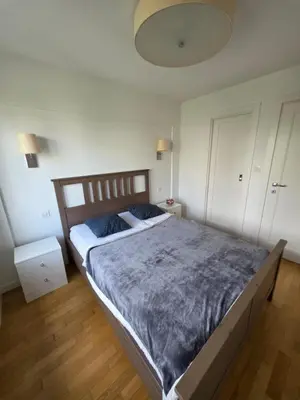 Łóżko lub łóżka w pokoju w obiekcie Apartament JP2 Central Spot