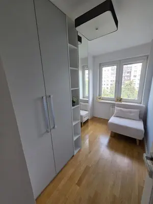 Łóżko lub łóżka w pokoju w obiekcie Apartament JP2 Central Spot