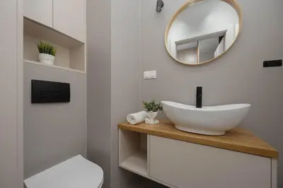 Łazienka w obiekcie Family Apartment with 3 Bedrooms and a Parking Space by Noclegi Renters