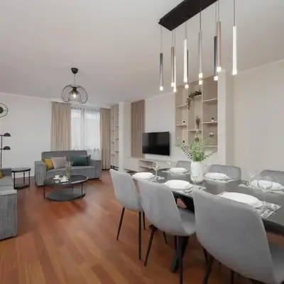 Family Apartment with 3 Bedrooms and a Parking Space by Noclegi Renters