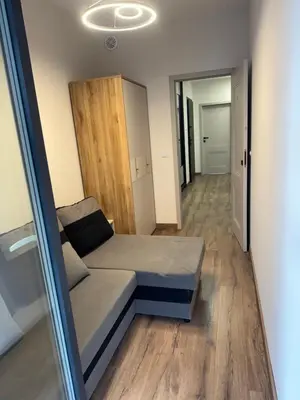Łóżko lub łóżka w pokoju w obiekcie Pokoje Warszawski Świt