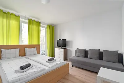Łóżko lub łóżka w pokoju w obiekcie Close - Central Apartments - City Center - Great Location - Kredytowa