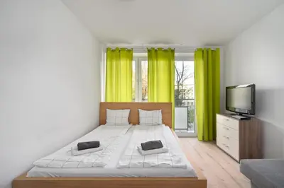 Łóżko lub łóżka w pokoju w obiekcie Close - Central Apartments - City Center - Great Location - Kredytowa