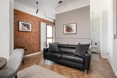 Część wypoczynkowa w obiekcie Metro Młociny Deluxe Apartment by BookingHost