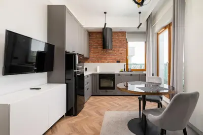 Kuchnia lub aneks kuchenny w obiekcie Metro Młociny Deluxe Apartment by BookingHost