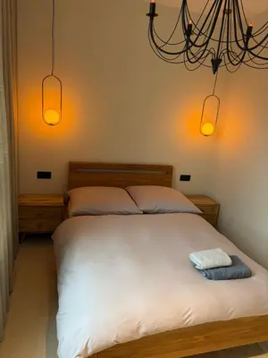 Łóżko lub łóżka w pokoju w obiekcie BlaBlaFlat Warszawa Aura Mokotów