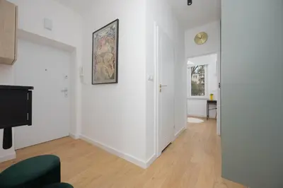 Telewizja i/lub zestaw kina domowego w obiekcie Family Apartment in Saska Kępa Bright & Functional Interiors with Balcony by Noclegi Renters