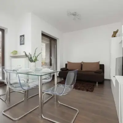 Służewiec Warsaw Bright Apartment with Garden&Parking by Noclegi Renters