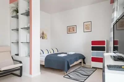 Łóżko lub łóżka w pokoju w obiekcie RentPlanet - Apartament Metro Młociny