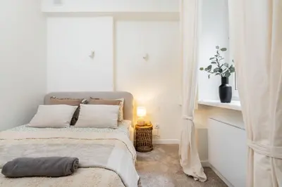 Łóżko lub łóżka w pokoju w obiekcie Zakrzewska 8 SuperApart