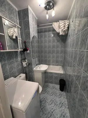 Łazienka w obiekcie Sahara Apartment Centrum