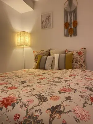 Łóżko lub łóżka w pokoju w obiekcie Boho Apartment, Salezego 6