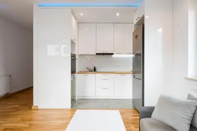 Kuchnia lub aneks kuchenny w obiekcie Warszawa Gocławek Spacious Apartment by BookingHost