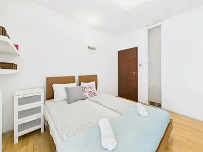Łóżko lub łóżka w pokoju w obiekcie Polkowska 11 SuperApart