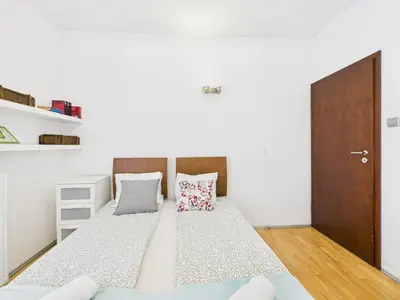 Łóżko lub łóżka w pokoju w obiekcie Polkowska 11 SuperApart