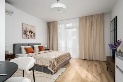 Łóżko lub łóżka w pokoju w obiekcie Warsaw Modern Stay Centrum Browary Warszawskie