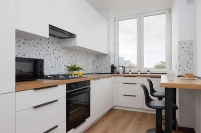Kuchnia lub aneks kuchenny w obiekcie Family Apartment with Homely Atmosphere and Excellent for Remote Working by Noclegi Renters