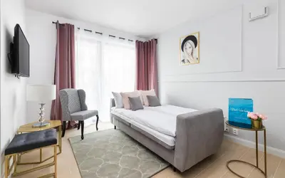 Telewizja i/lub zestaw kina domowego w obiekcie Modern Apartment Warsaw Burakowska By Noclegi Renters