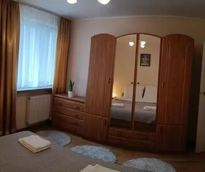 Łóżko lub łóżka w pokoju w obiekcie Apartament Bluehouse