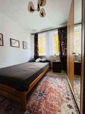 Łóżko lub łóżka w pokoju w obiekcie Ptasia4