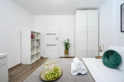 Łóżko lub łóżka w pokoju w obiekcie Lumina 3 room apartment in Warsaw
