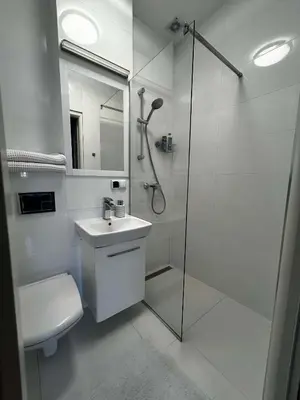 Łazienka w obiekcie Downtown Place Apartment