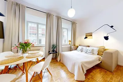Łóżko lub łóżka w pokoju w obiekcie Old Town Living Studio Freta