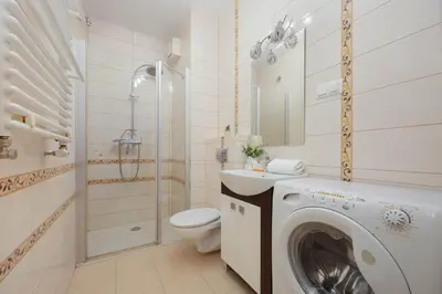Łazienka w obiekcie Grey Apartment in Warsaw with City View and Balcony by Noclegi Renters