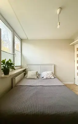 Łóżko lub łóżka w pokoju w obiekcie Cozy Stay Saska Kępa