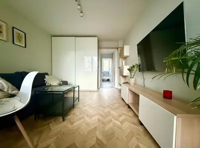 Telewizja i/lub zestaw kina domowego w obiekcie Cozy Stay Saska Kępa