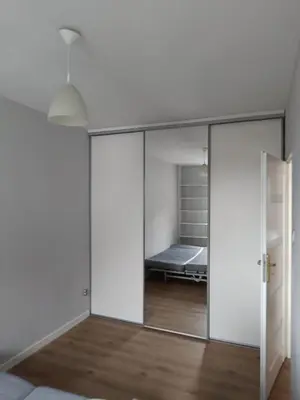 Łóżko lub łóżka w pokoju w obiekcie Apartament Jana