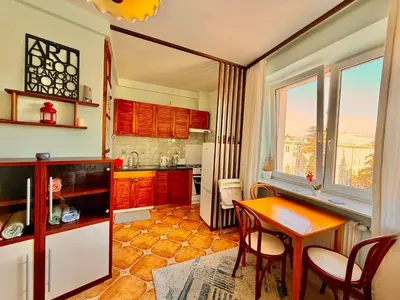 Kuchnia lub aneks kuchenny w obiekcie Cozy Apartmant next to Metro