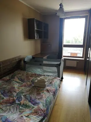 Łóżko lub łóżka w pokoju w obiekcie Bielany Residence Apartment & Parking