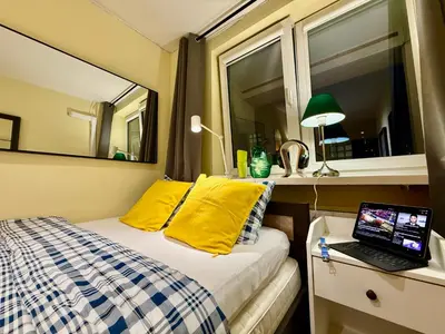 Łóżko lub łóżka w pokoju w obiekcie VIEW 4 Panorama 85'TV Wifi 2 GBs Netflix HBO SkyShowMax