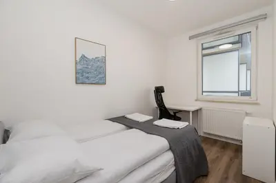 Łóżko lub łóżka w pokoju w obiekcie ShortStayPoland Budki Szczęśliwickie B131