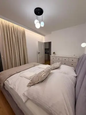 Łóżko lub łóżka w pokoju w obiekcie Forest Apart VIII Aleje Jerozolimskie