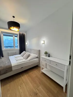 Łóżko lub łóżka w pokoju w obiekcie Forest Apart VIII Aleje Jerozolimskie