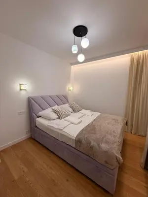 Łóżko lub łóżka w pokoju w obiekcie Forest Apart VIII Aleje Jerozolimskie