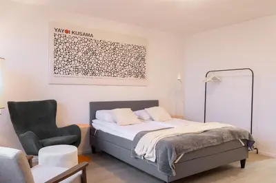 Łóżko lub łóżka w pokoju w obiekcie Studio Apartment with a City View | Metro Świętokrzyska