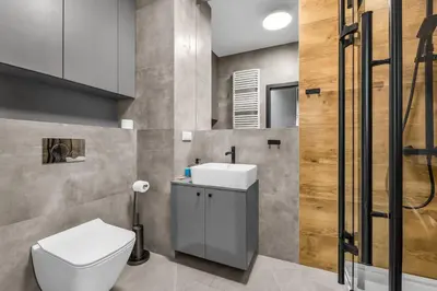 Łazienka w obiekcie Kłobucka Deluxe Apartment by BookingHost